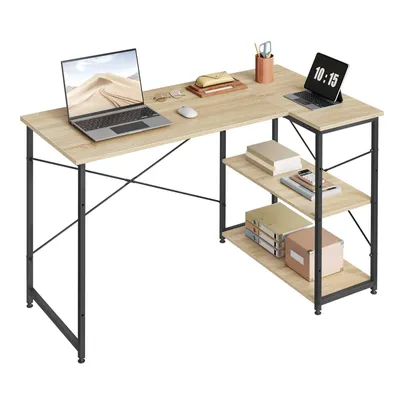 A desk with two laptops, books, and office supplies on a white background.