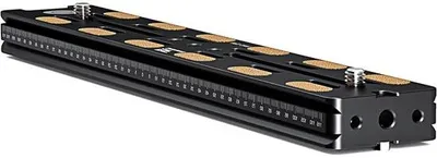Imagen del producto de Placa de liberación rápida de aluminio profesional con conexión de 1/4 de pulgada y sistema de ranura en T, compatible con cámaras, trípodes y estabilizadores (240 mm)