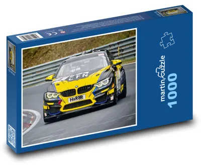Obrázok produktu pre Puzzle 1000 Žlté závodné auto na trati - martinpuzzle