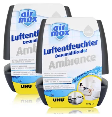 Two units of UHU Air Max Ambiance dehumidifier packaging are shown in a studio shot with a white background and subtle lighting.