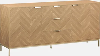 A wooden sideboard with a herringbone pattern on the doors and drawer fronts, supported by metal legs.