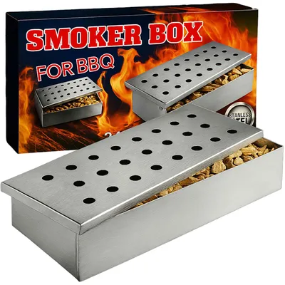 A product shot of a smoker box for BBQ, with the packaging in the background.