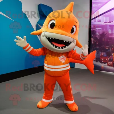 Produktbild von Orangefarbener REDBROKOLY Hai Maskottchen Kostüm gekleidet mit einem grafischen T-Shirt und Fußkettchen