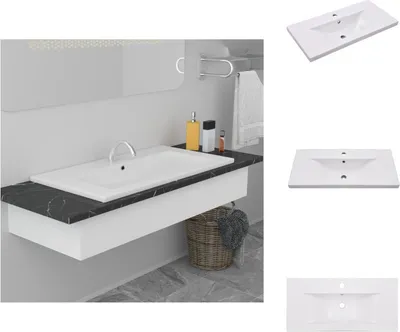 A bathroom vanity with a sink and countertop.