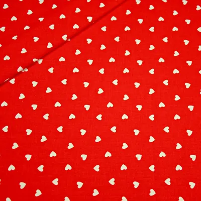 Produktbild von Baumwolle 100% Herzen 8mm weiß auf rotem Hintergrund