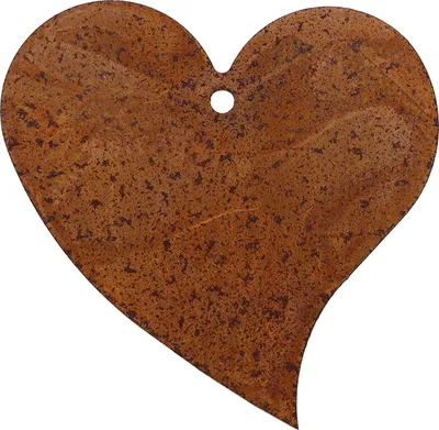 A rusted metal heart decoration with a hole for hanging.