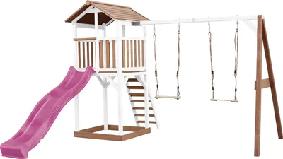 Immagine prodotto di AXI Beach Tower parco giochi in legno in marrone e bianco | Torre di gioco per bambini con sabbiera, doppia altalena e scivolo viola | Playhouse su palafitte per il giardino