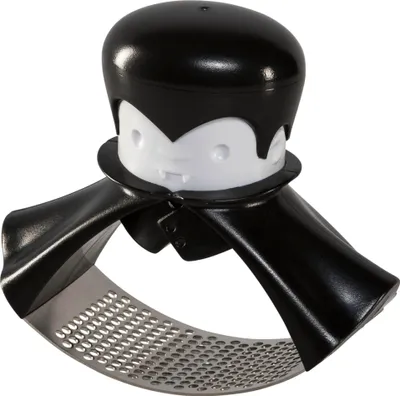 A product shot of a garlic press designed to look like a vampire.