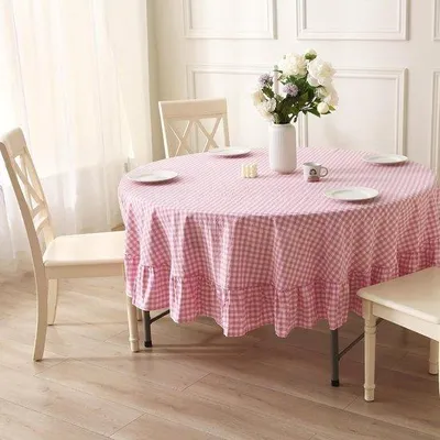 Immagine prodotto di Tovaglia in cotone rosa a rombi, diametro 180 cm, decorazione in stile rustico con motivo a rombi.