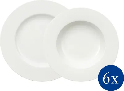 Two white plates are shown on a white background. One plate is larger and behind a smaller plate. The smaller plate has a rim and a deeper bowl.