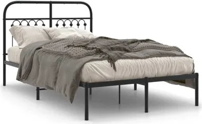 A black metal bed frame with a headboard, shown with bedding.