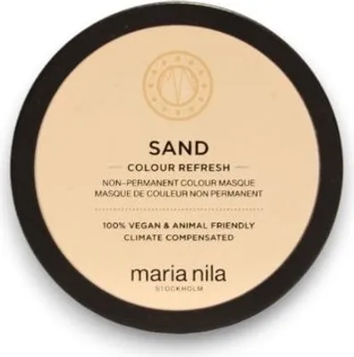 A top-down view of a round cosmetic product container.