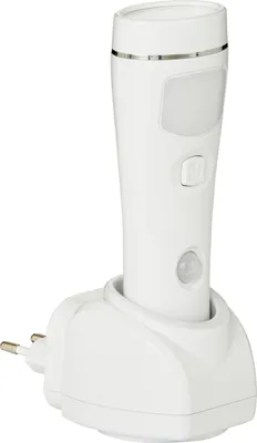A white LED plug-in night light with a built-in flashlight and motion sensor, shown in its charging base.