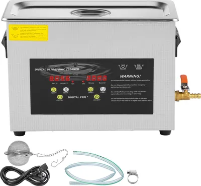 A digital ultrasonic cleaner with its accessories.