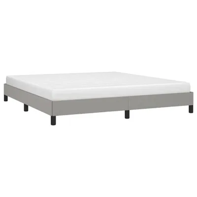 A bed frame with a mattress on a white background.