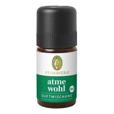 A product shot of a small bottle of essential oil with a black cap and a label.