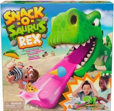 The image shows the box of the board game Snack-o-Saurus Rex, featuring a cartoon dinosaur with a long pink tongue, children playing, and various snacks.