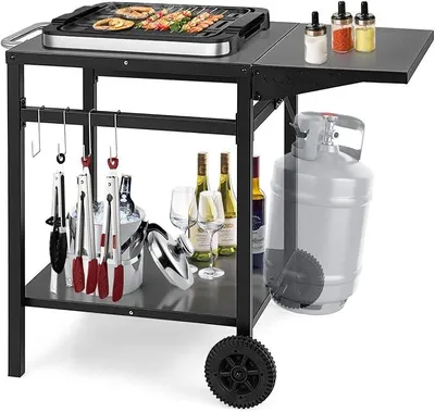 Produktbild von Grillwagen mit klappbarer Tischplatte, Beweglicher Campingtisch mit 2 Ablagen & 4 Haken, Metall Grilltisch für Außenbereich, Rollwagen zum Grillen & Outdoorküche, Zubereitungswagen Schwarz
