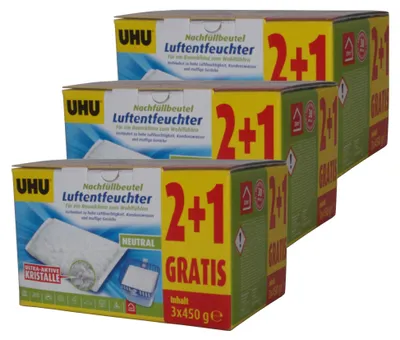 Three boxes of UHU Luftentfeuchter (air dehumidifier) refill bags are stacked diagonally.