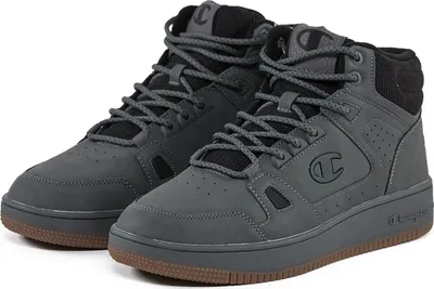 A pair of gray Champion mid-top sneakers with brown soles.