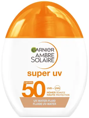 Produktbild von Garnier Ambre Solaire Super UV UV-Water-Fluid LSF 50 – Getönte Sonnencreme für das Gesicht – 12h Frische & Dry-Touch Effekt – Zieht schnell ein