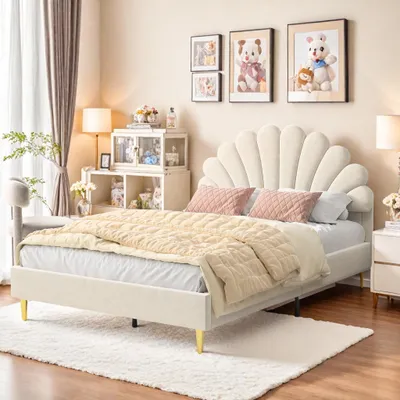 A bedroom scene featuring a bed with a decorative headboard, bedding, and surrounding furniture.