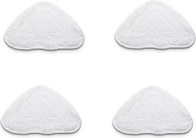 Four white mop pads arranged in a grid on a white background.