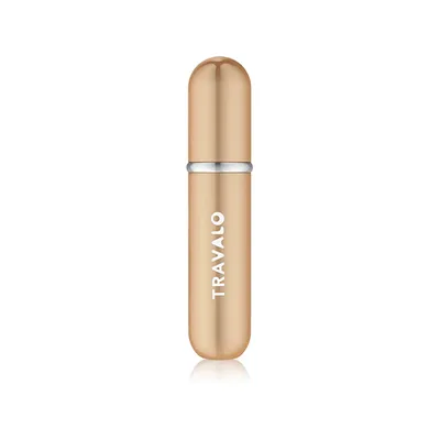 A gold colored perfume atomizer is shown against a white background.