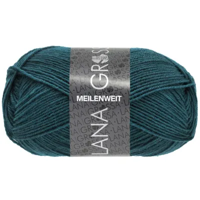 A ball of teal yarn with a label wrapped around it.