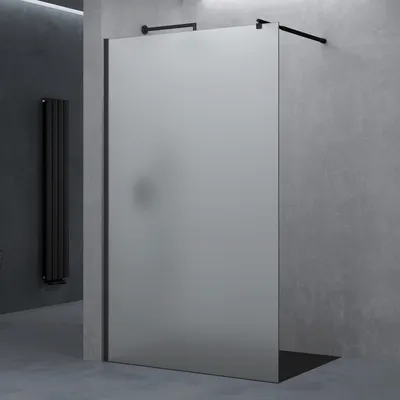 A frosted glass shower wall in a modern bathroom setting.