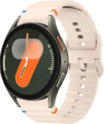 A close-up studio shot of a pink smartwatch with a ribbed strap.