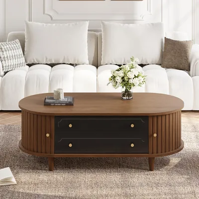 Imagen del producto de Mesa de centro de 100 x 50 x 36 cm, fabricada en aglomerado con acabado en madera de nogal y , mesa ovalada para el salón con 2 cajones, 2 puertas abatibles y 4 patas