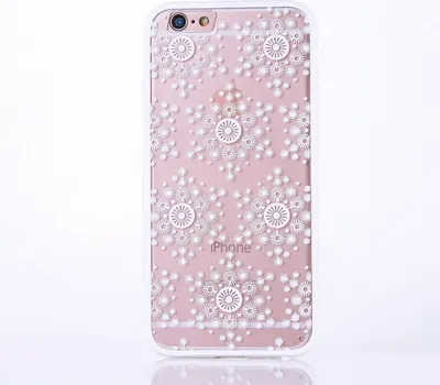 A pink iPhone case with a white snowflake pattern is shown against a white background.
