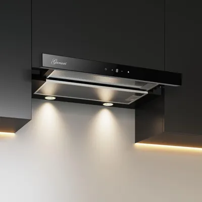 A modern black range hood is installed above a counter with under-cabinet lighting.