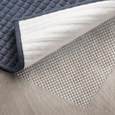 Produktbild von Praktische Teppich Antirutschunterlage, Antirutschmatte zuschneidbar, 80 x 200 cm, Rutsch Stop für Teppiche, Schubladen, Kofferraum, creme-weiss