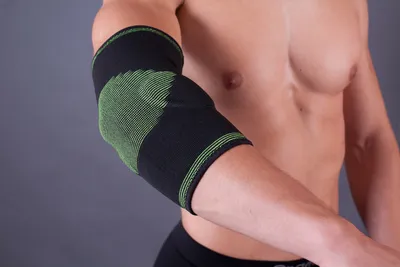 Produktbild von LOREY- Hochwertige Ellbogenbandage mit 2 seitlichen Gelkissen, Ellenbogenstütze; Größe: M