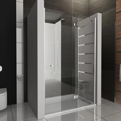 A modern bathroom with a glass shower enclosure.