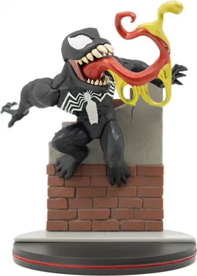 A Venom Q-Fig diorama figure perched on a brick structure.