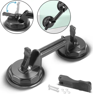 A black double suction cup lifter with two suction cups and a handle, shown on a white background. Inset images show how the suction cups work and are attached to a glass surface.