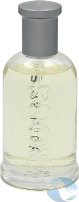 A bottle of Hugo Boss perfume on a white background.