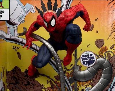 A Spider-Man statue with Doctor Octopus's mechanical arms, set against a comic book-style background.