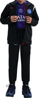 Produktbild von Nike Paris Saint-Germain Woven Trainingsanzug Kinder