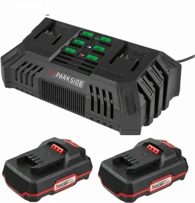 A black Parkside dual battery charger with two 2.0 Ah batteries.