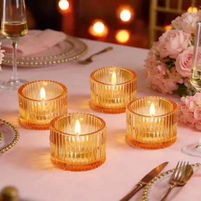 Immagine prodotto di Candele portacandele in vetro dorato, set da 4, ideali per occasioni speciali