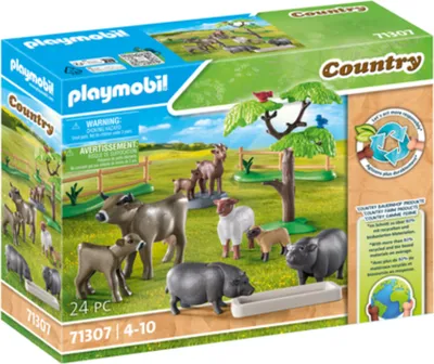 A Playmobil Country farm animal playset packaging showing the contents and a farm scene.