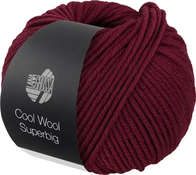 A ball of burgundy yarn with a black label.