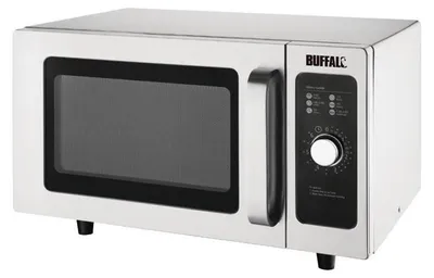 A professional studio shot of a silver Buffalo microwave oven.