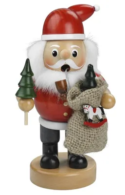 Räuchermännchen Weihnachtsmann trägt ein rotes Gewand, einen weißen Bart und eine rote Mütze.