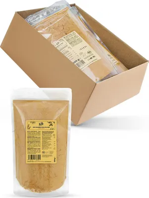 A cardboard box containing multiple pouches of powder, with one pouch in the foreground.