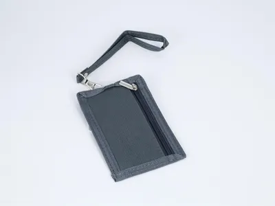 A gray wallet with a clear window and a wrist strap is shown against a white background.